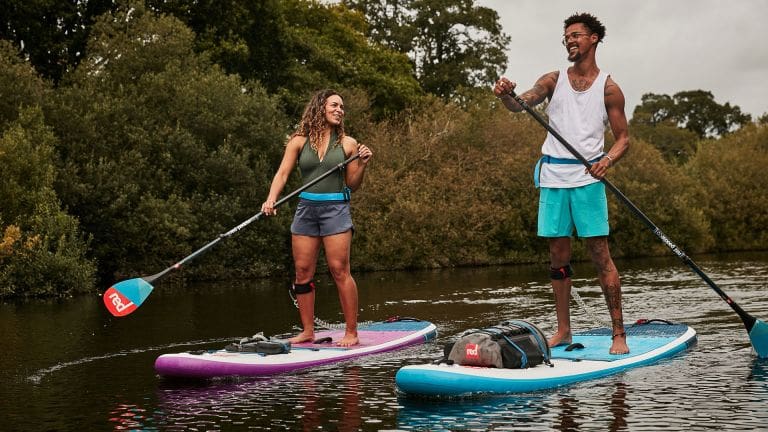 Man and women on SUP boards